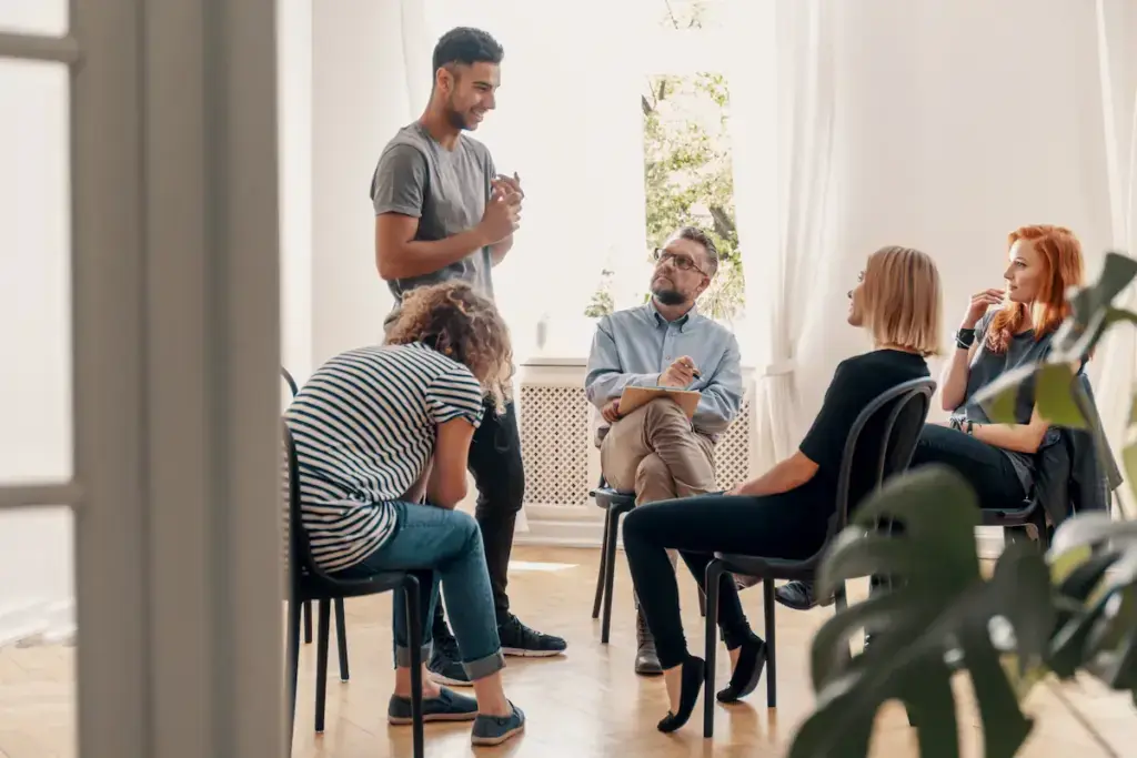 supportive group therapy session in a bright room 2026 09 22 18 39 59 utc